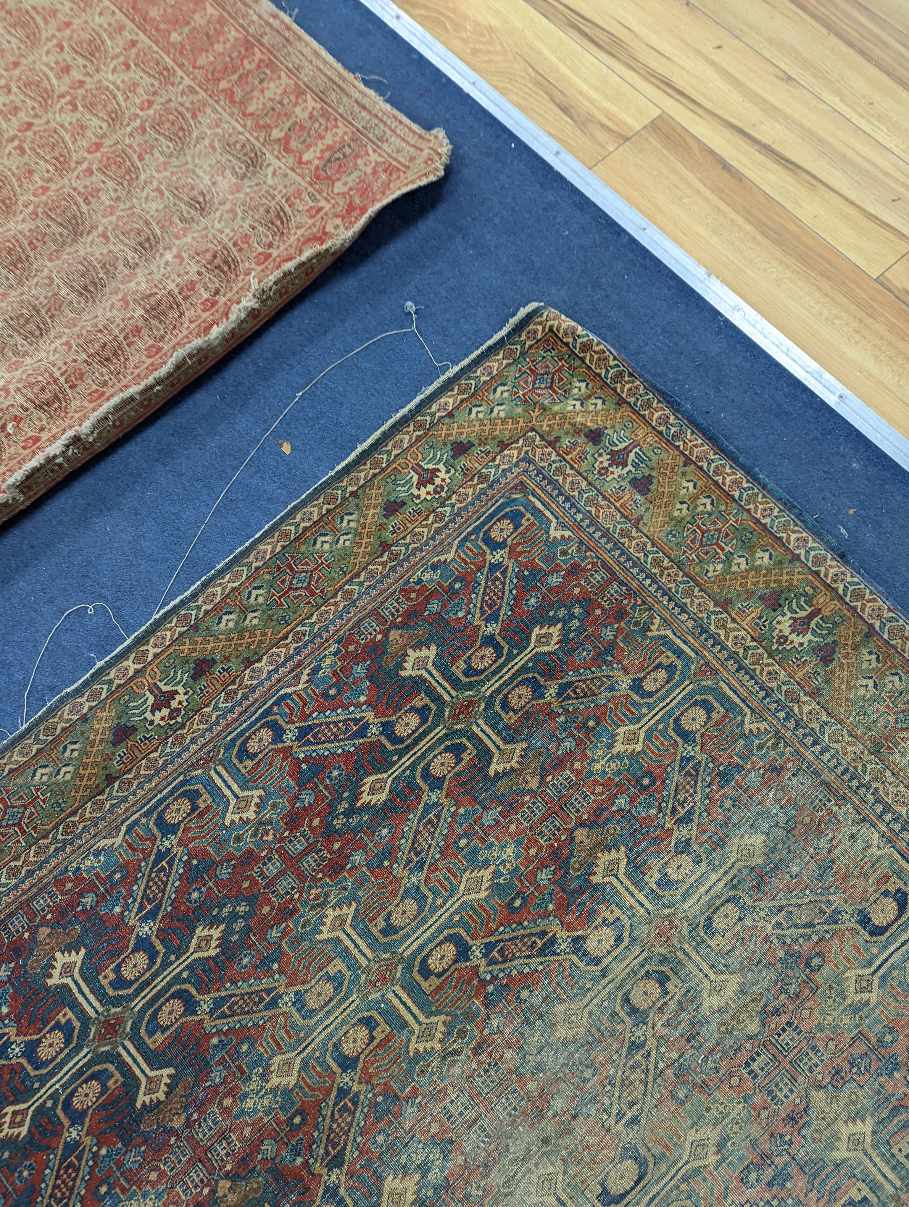 Three antique rugs, Caucasian and North West Persian, largest 230 x 154cm